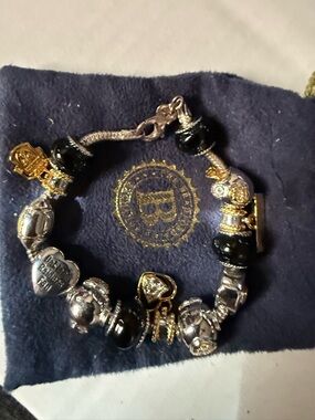 Charm Bracelet with Black Glass Beads and Silver & Gold Accents